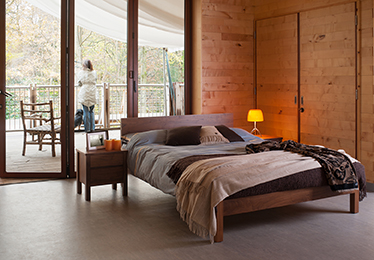 Rustic country bedroom setting for our solid Walnut Sahara bed