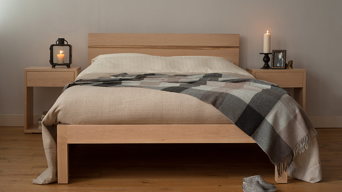 Maple tibet wooden bed with alpaca throw for a Scandinavian Bedroom look