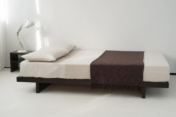 Contemporary low wooden platform bed without optional headboard