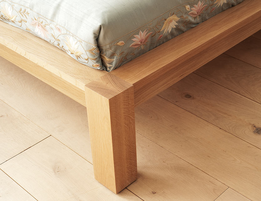 A closer view of the leg of the Ocean Contemporary wooden bed