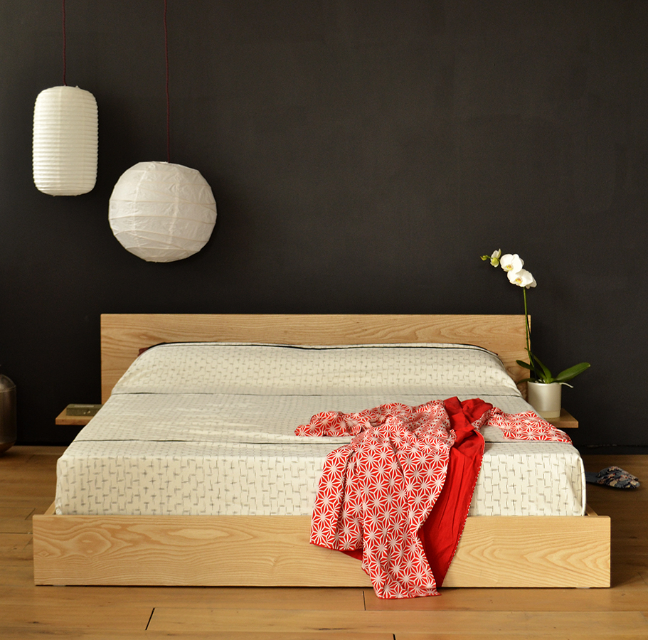 Kulu low wooden bed or Futon base. Hand made in UK from solid timbers and in a range of sizes.