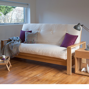 Cuba luxury sofa bed in Oak with a futon mattress shown in sofa position