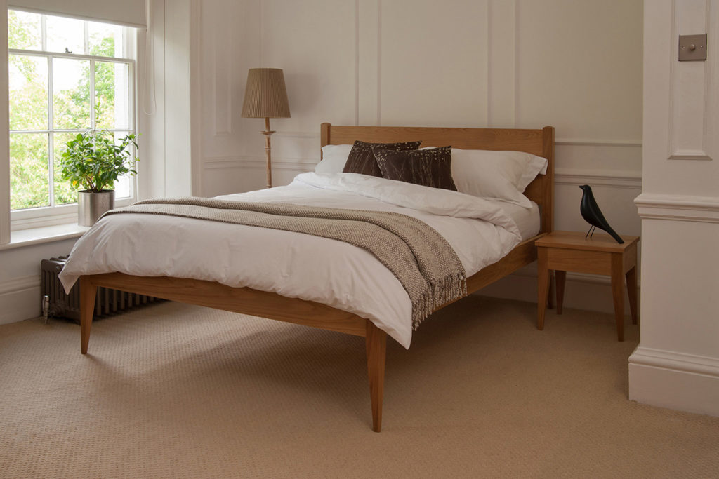 The Cochin contemporary classic wooden bed, here made in Oak