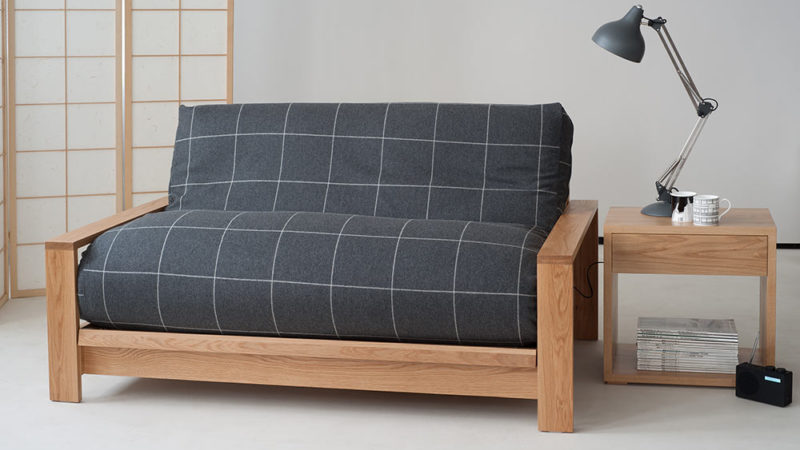 Panama solid wood futon sofa bed showing futon with a charcoal wool removable cover