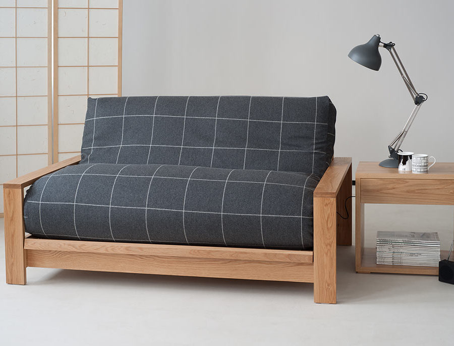 Panama solid wood futon sofa bed showing futon with a charcoal wool removable cover