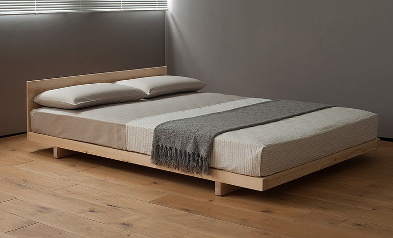 Kobe is a low platform style wooden bed shown here in Pine