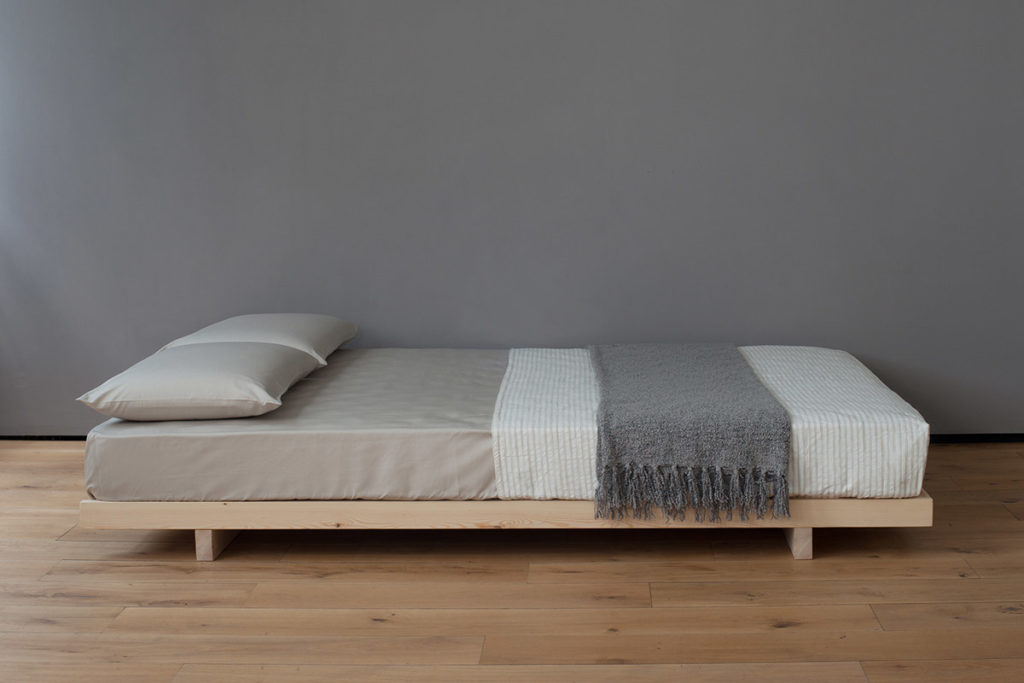 Japanese style low beds wooden Kobe bed or futon base shown without headboard