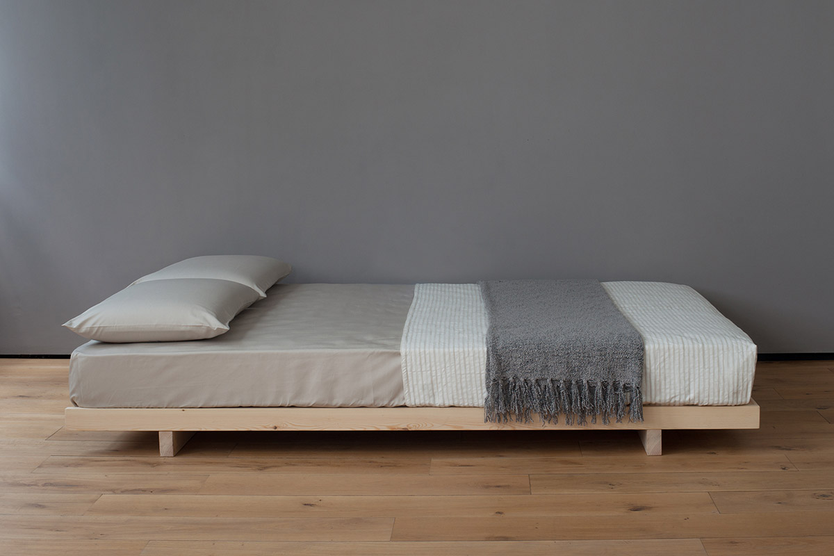 Japanese style low wooden Kobe bed or futon base shown without headboard