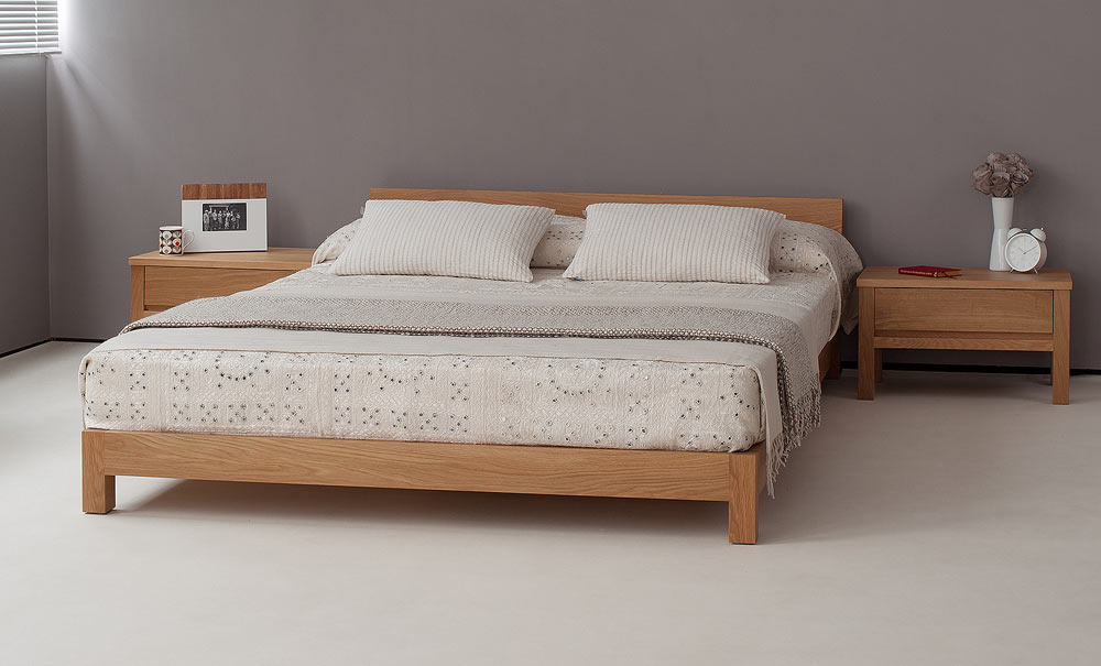 Nevada chunky low wooden bed hand made in Britain from solid Oak