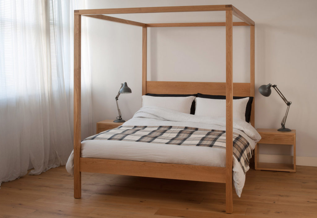 Orchid a contemporary solid wood four poster bed shown here in Oak