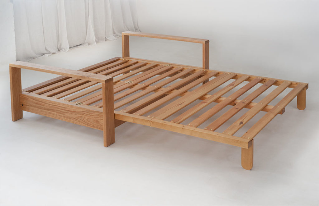 Panama Oak framed futon sofa bed, shown in the bed position and without a futon mattress