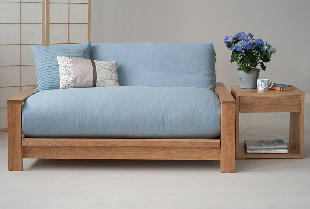 Panama Oak futon sofa bed showing futon mattress with pale blue wool removable cover