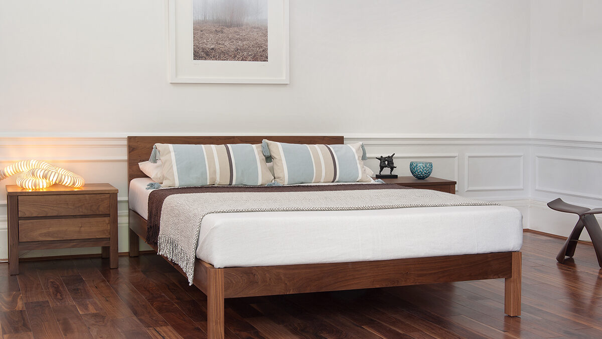 Low contemporary Walnut Sahara bed hand made in uk