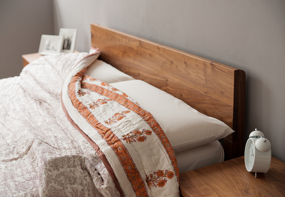 A closer view of the Sahara contemporary wooden bed headboard in Walnut