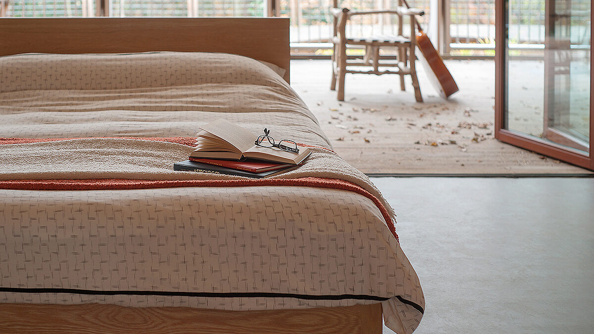 Sonora a contemporary low wooden bed in solid oak