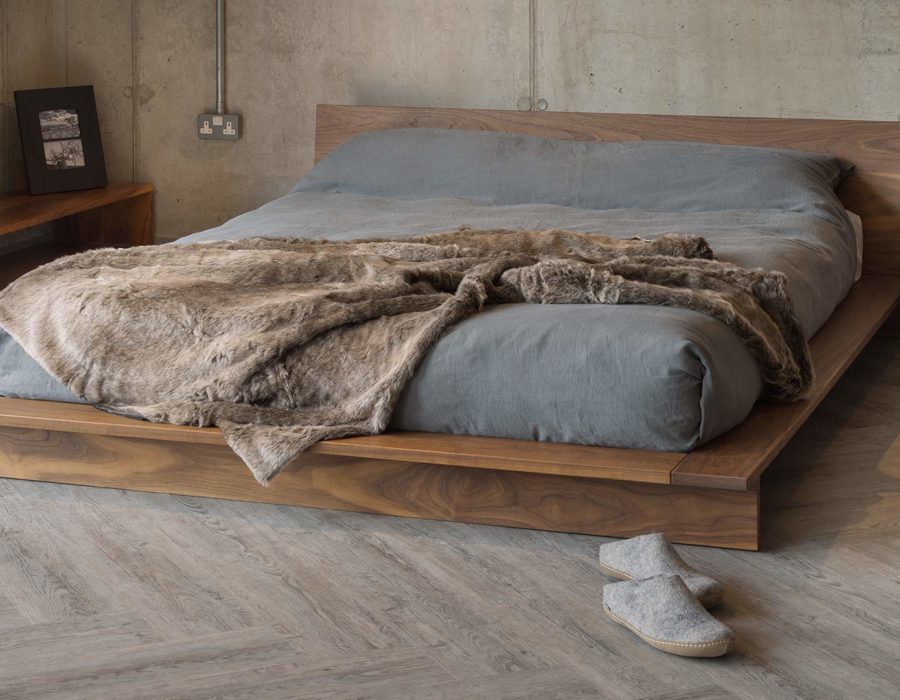 Loft style bedrooms, the low wooden platform bed, the Oregon shown in Walnut wood