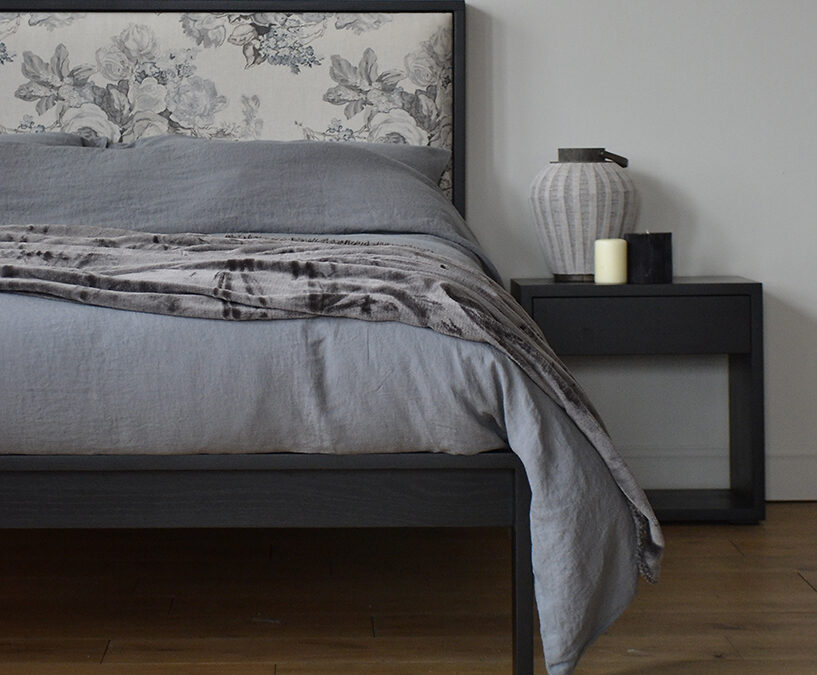 Charcoal linen bedding and cosy blanket on black oak Shetland bed