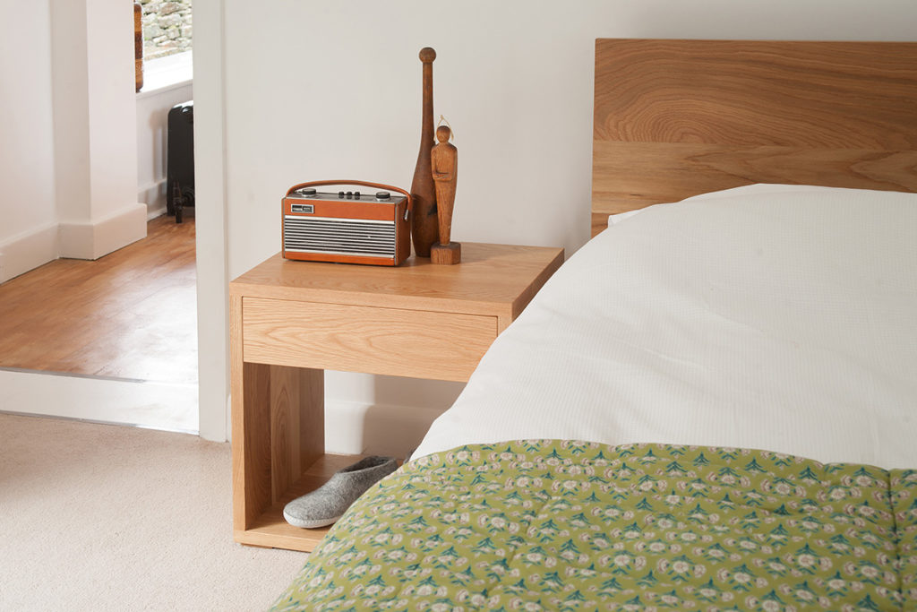 We hand make our Cube bedside drawer tables in Britain, in a choice of wood and in 3 size options.