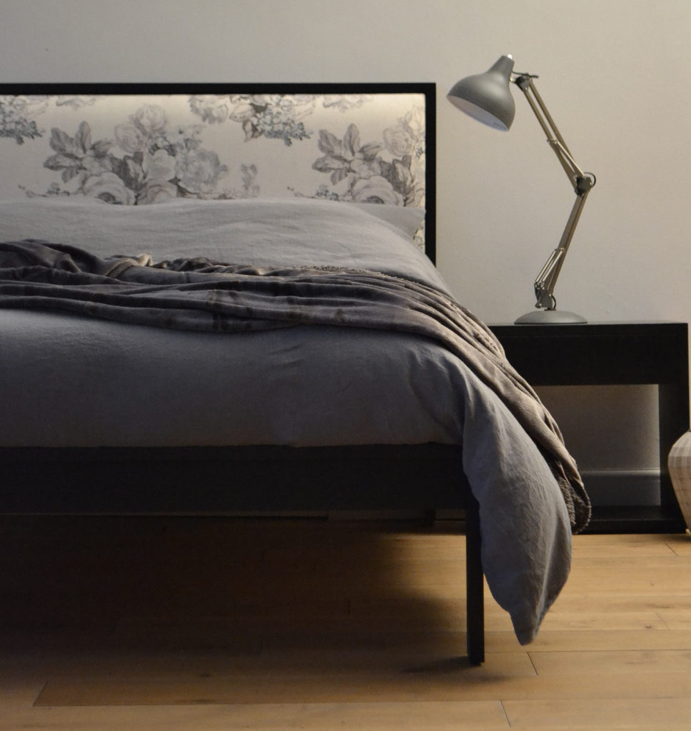 grey linen bedding on black painted oak shetland wooden bed