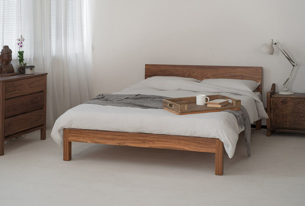 Dove grey linen bedding on our hand made low wooden Sahara bed