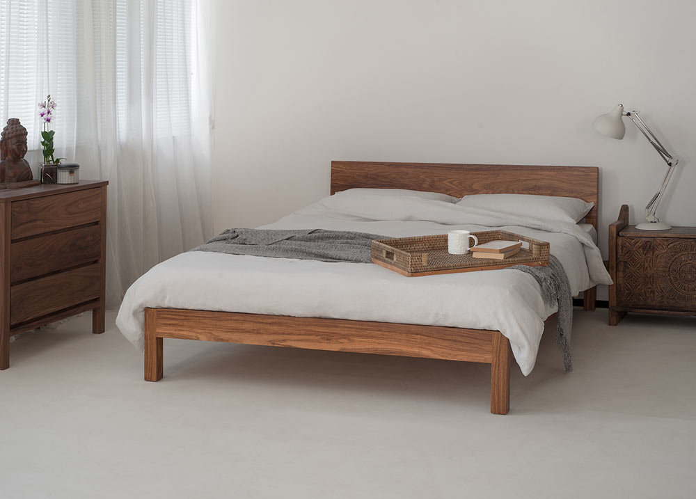 Dove grey linen bedding on our hand made low wooden Sahara bed