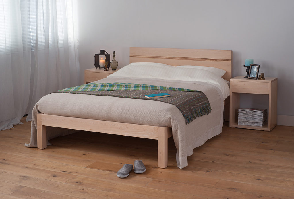 Contemporary chunky solid wood Tibet bed in Maple with a Walnut stripe in the headboard.