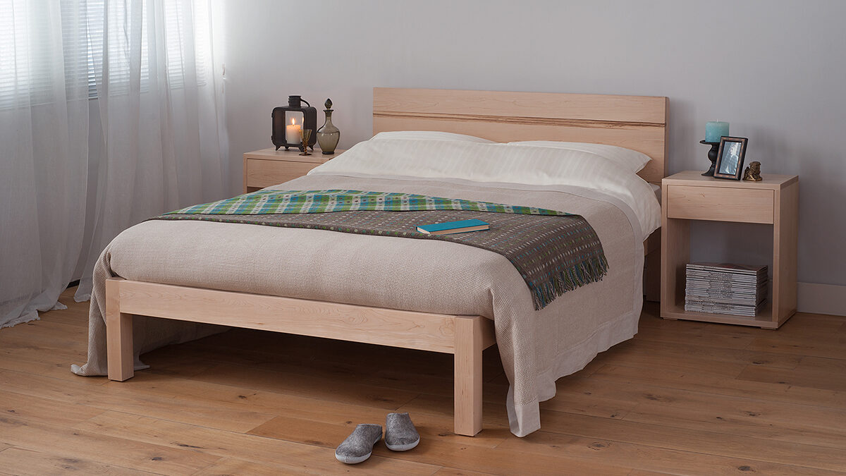 Contemporary chunky solid wood Tibet bed in Maple with a Walnut stripe in the headboard.