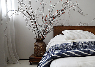 Exotic Asian inspired bedroom look featuring our Sonora low wooden bed in an African hardwood