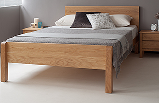 Tibet contemporary wooden bed in oak with footboard