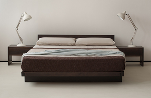 Our handmade kumo low bed shown with matching bedside tables