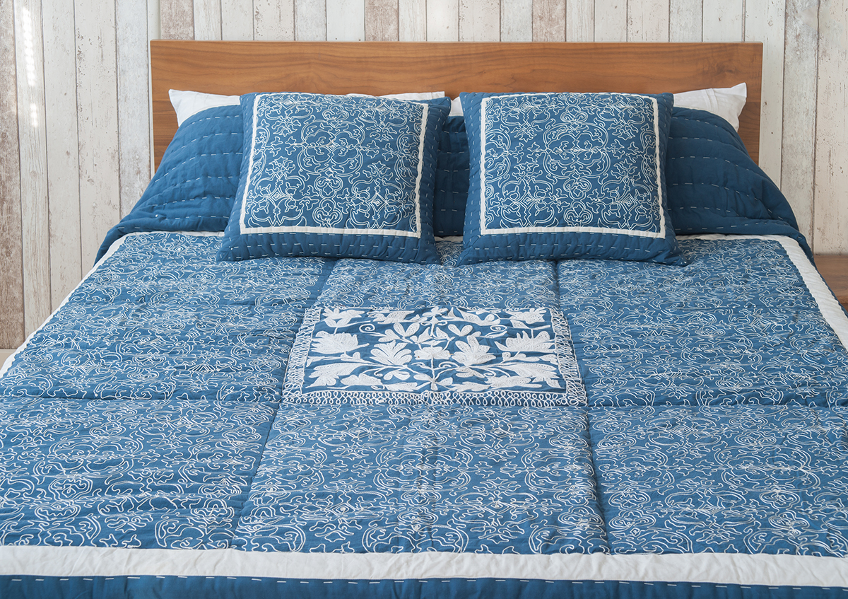 blue embroidered bedspread