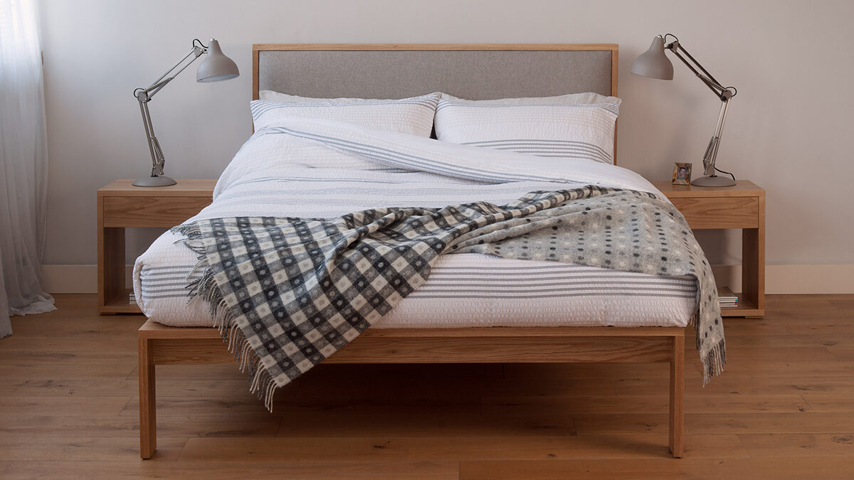 Contemporary bedroom with Shetland, a wooden bed with padded headboard