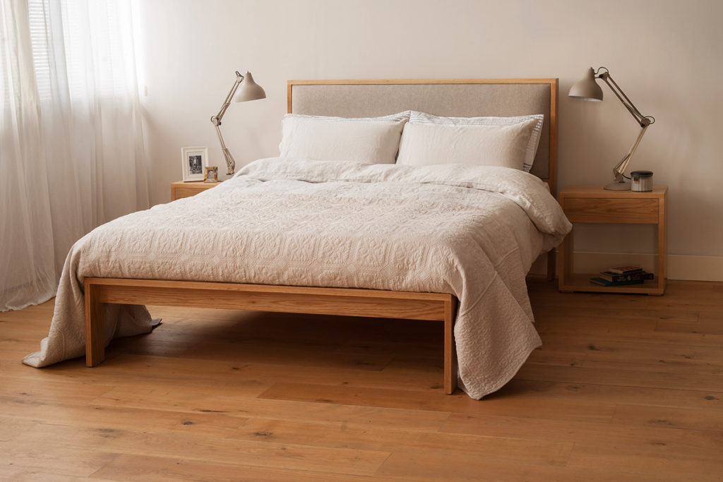 Shetland wooden bed frame with padded headboard in neutral colours bedroom