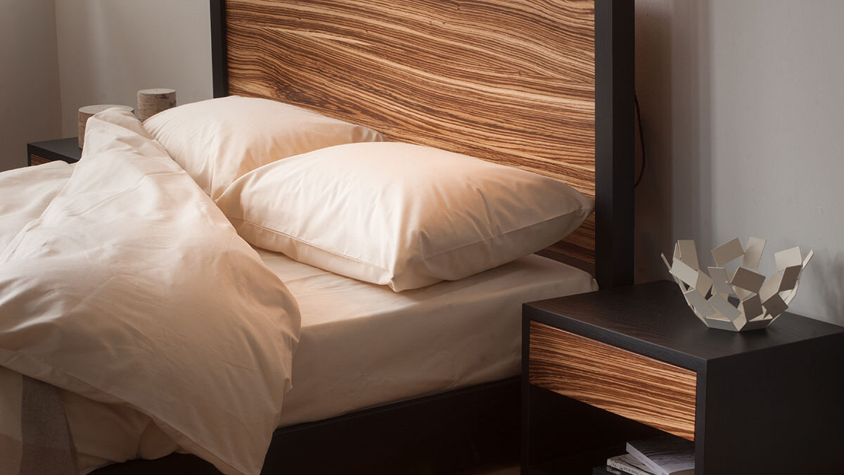 Hand made, unique and bespoke Cube contemporary 4-poster Bed with Zebrano wood headboard.