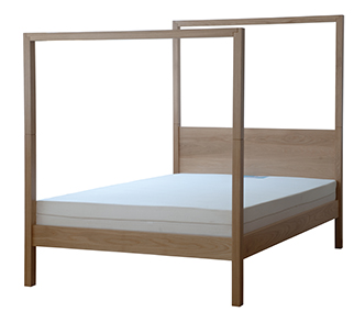 A plain view of the Oasis modern 4 poster bed made in Oak