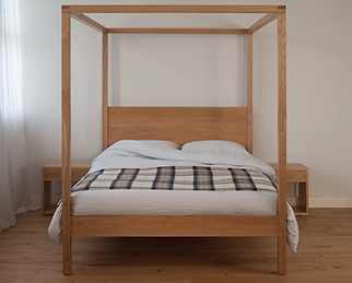 A contemporary solid wood 4 poster bed, the Orchid, available in a choice of timber and in a range of sizes