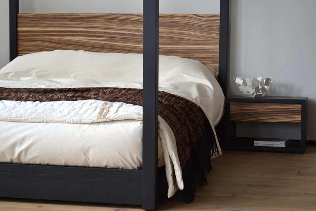 Unique and bespoke black oak and zebrano wood Cube 4-poster bed and bedside table.