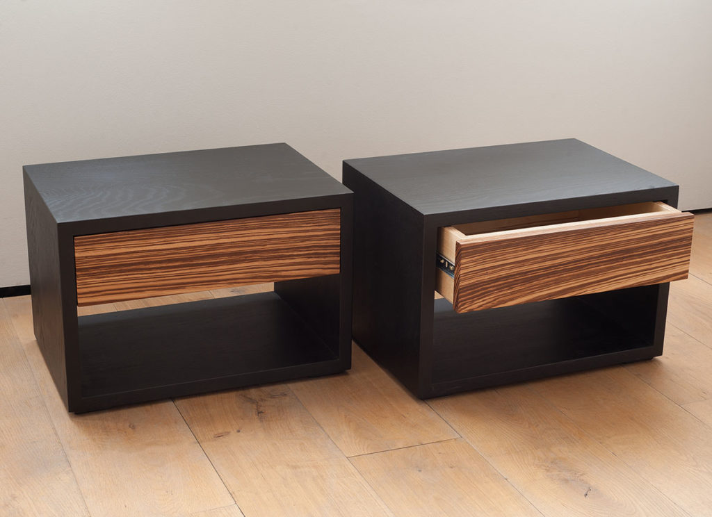 Bespoke Zebrano wood cube bedside tables with a drawer.