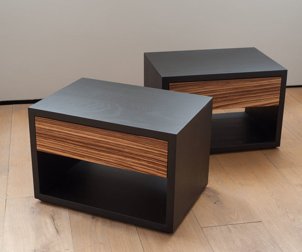 Bespoke Cube bedside tables in Black Oak with Zebrano wood drawer fronts.