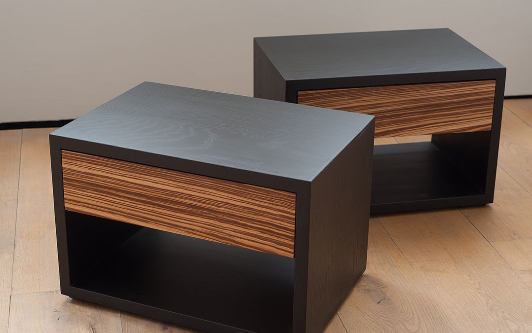 Bespoke Cube bedside tables in Black Oak with Zebrano wood drawer fronts.