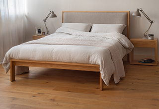 Summer bedroom styles, linen bedding on our Oak Shetland contemporary wooden bed