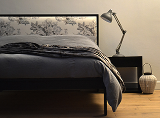 black painted wooden framed Shetland bed with matching bedside table