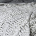 white faux fur throw