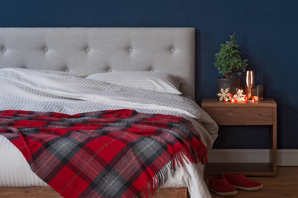 For a cosy christmas bedroom - Grey upholstered Arran bed with Cube bedside table in Walnut