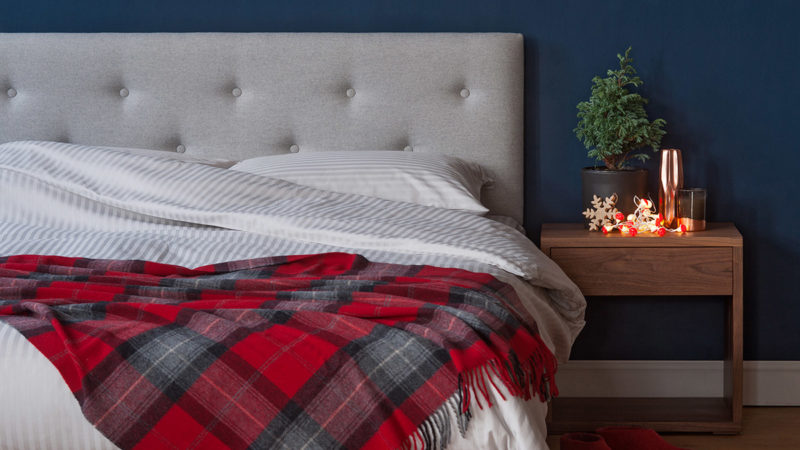 For a cosy christmas bedroom - Grey upholstered Arran bed with Cube bedside table in Walnut