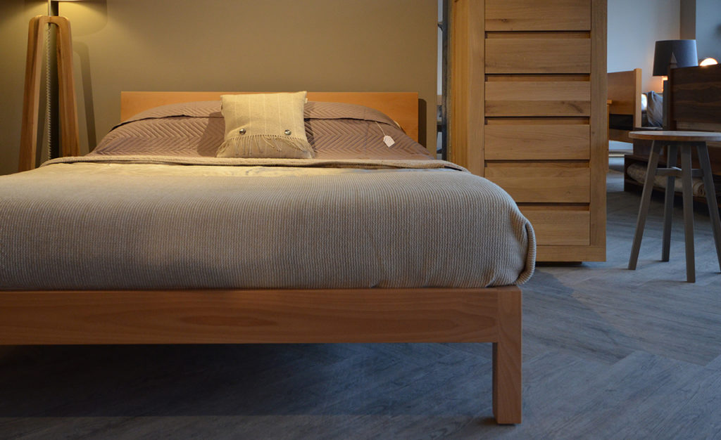 blog - our Sheffield Showroom showing a low wooden Sahara bed in Beech wood