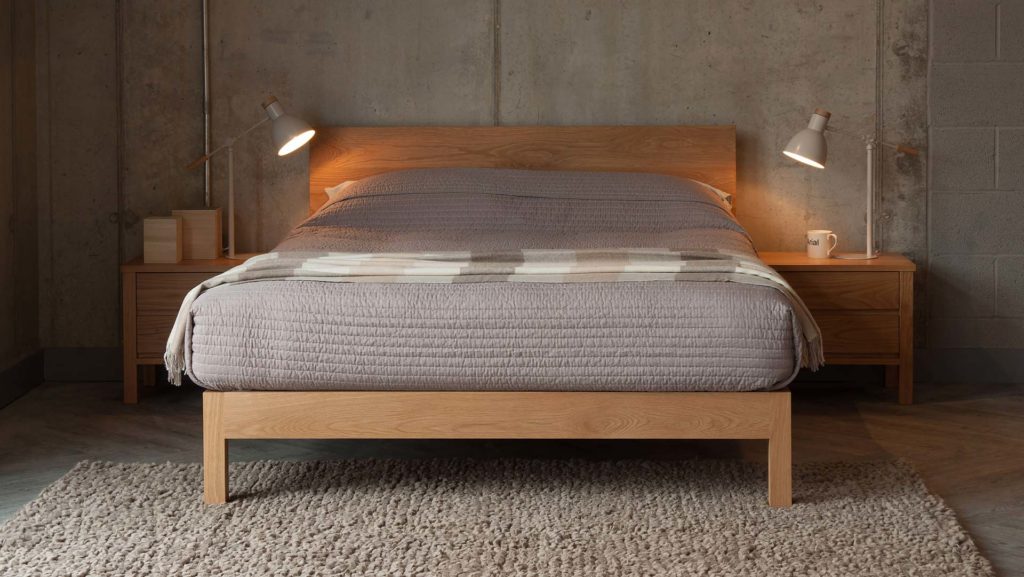 Oak Malabar wooden bed made in Britain from solid timber and in a range of bed sizes