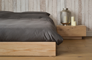 Ki low wooden platform bed in Ash with Madra bedside table