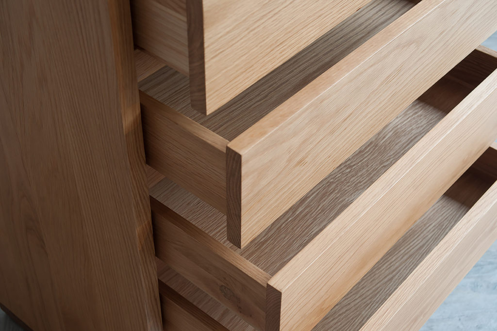 close-up shot of a 5 drawer Cube storage chest in Oak, drawers open