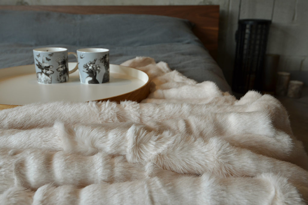 cream faux fur throw